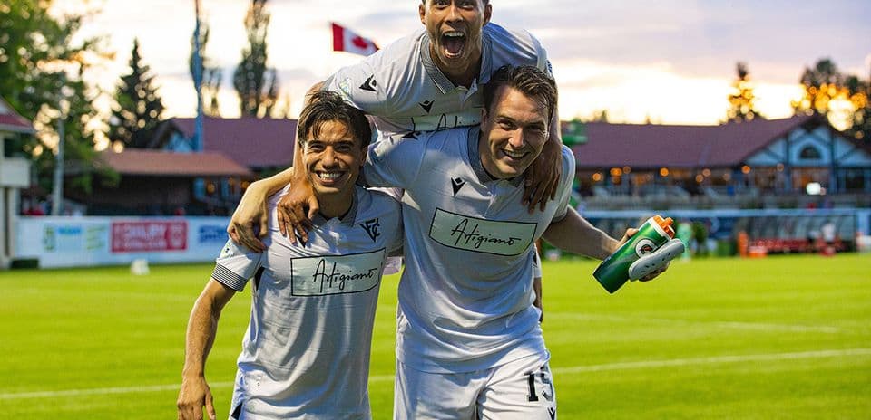 Vancouver FC players celebrating after a goal