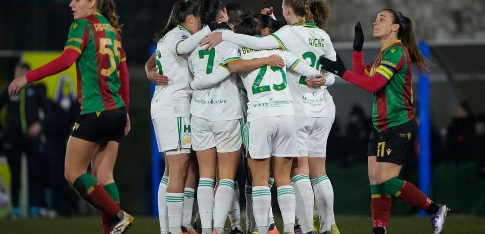 Players celebrating a goal during football match