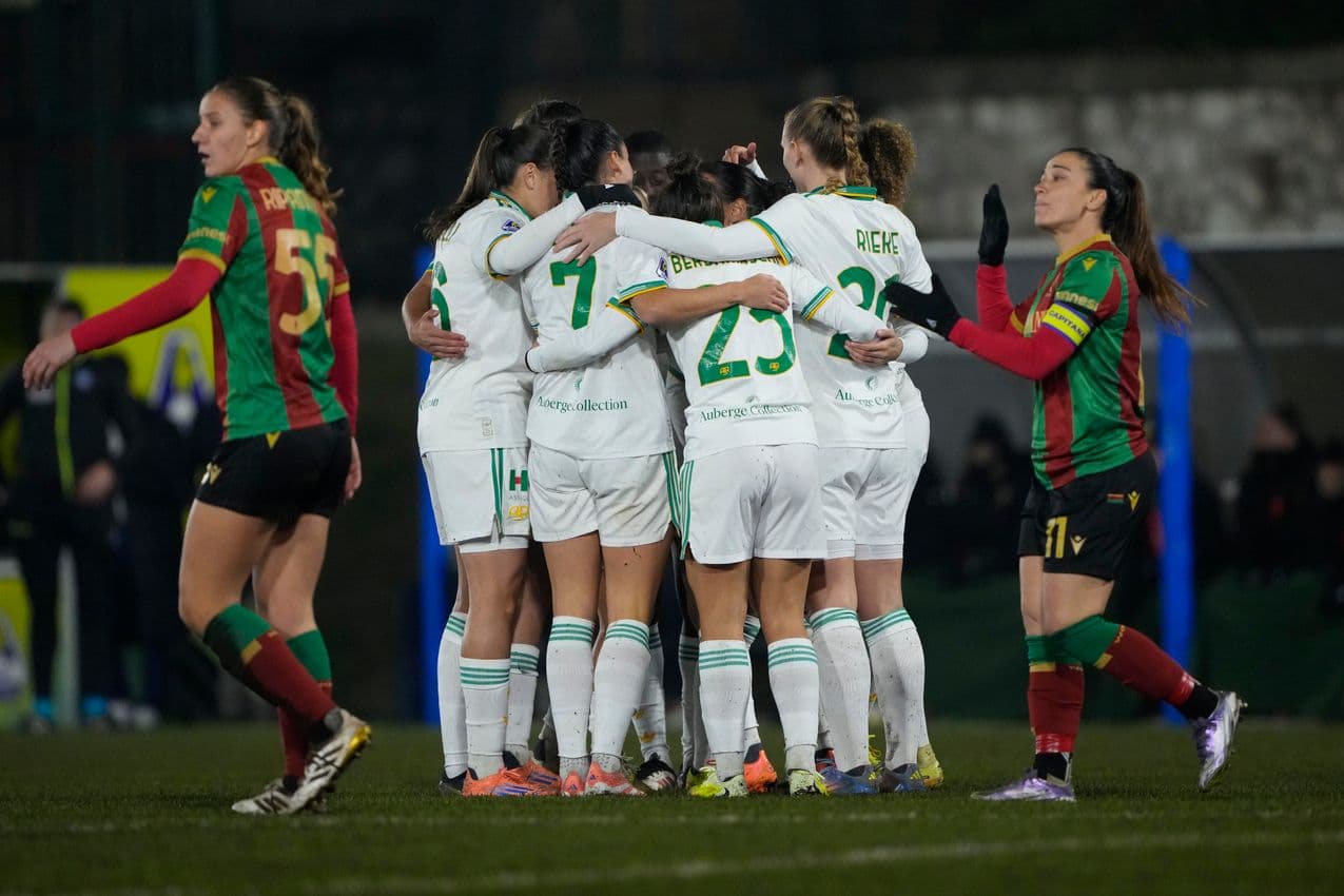 Players celebrating a goal during football match