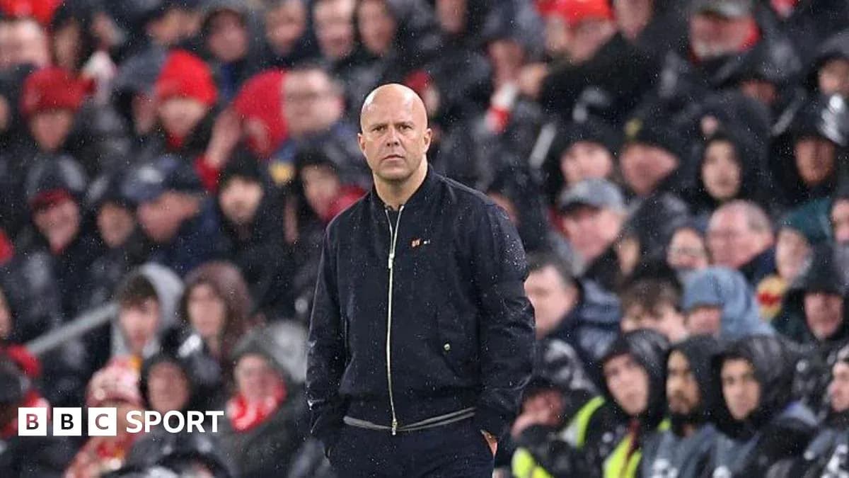 Coach observing the match from the sidelines