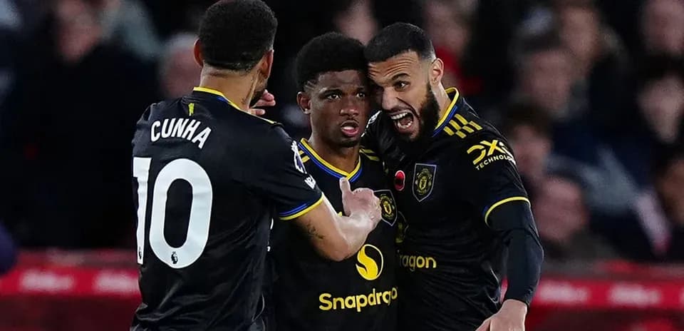 Manchester United players celebrating a goal
