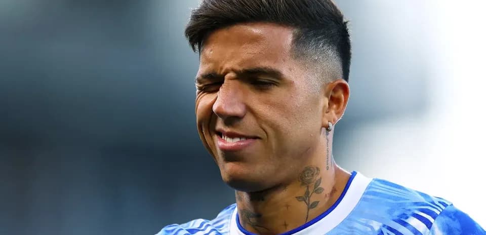 Player winking during warm-up in blue jersey