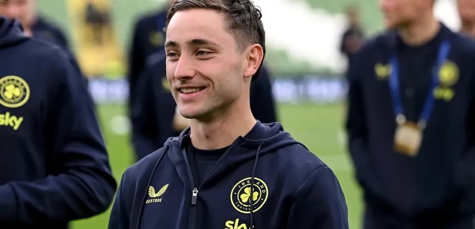 Player smiling during warm-up before match