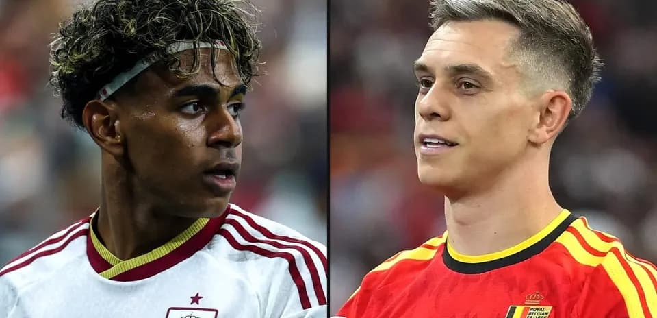 Two football players in national team jerseys