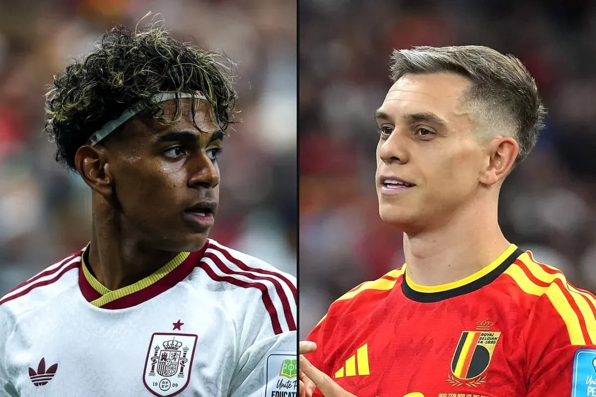 Two football players in national team jerseys