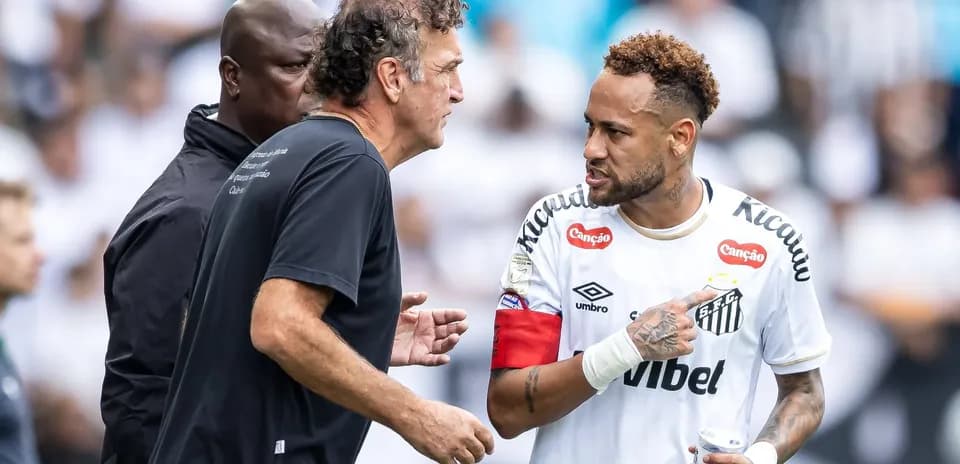 Neymar discussing strategy with coach during match