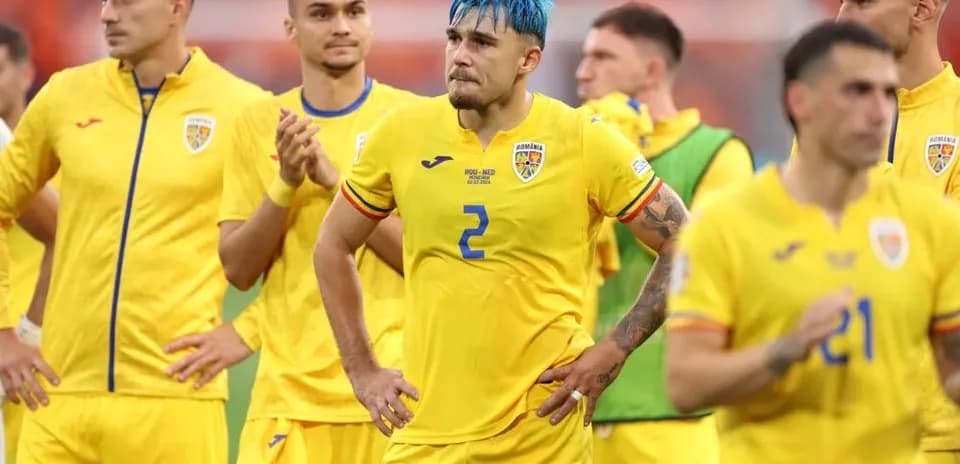 Romanian football team in yellow jerseys after match