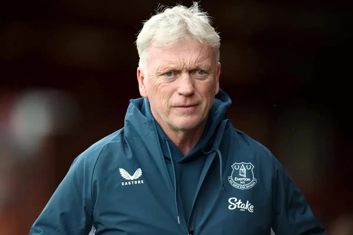 Manager wearing Everton jacket before match