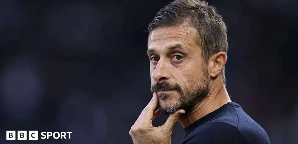 Coach contemplating during a match