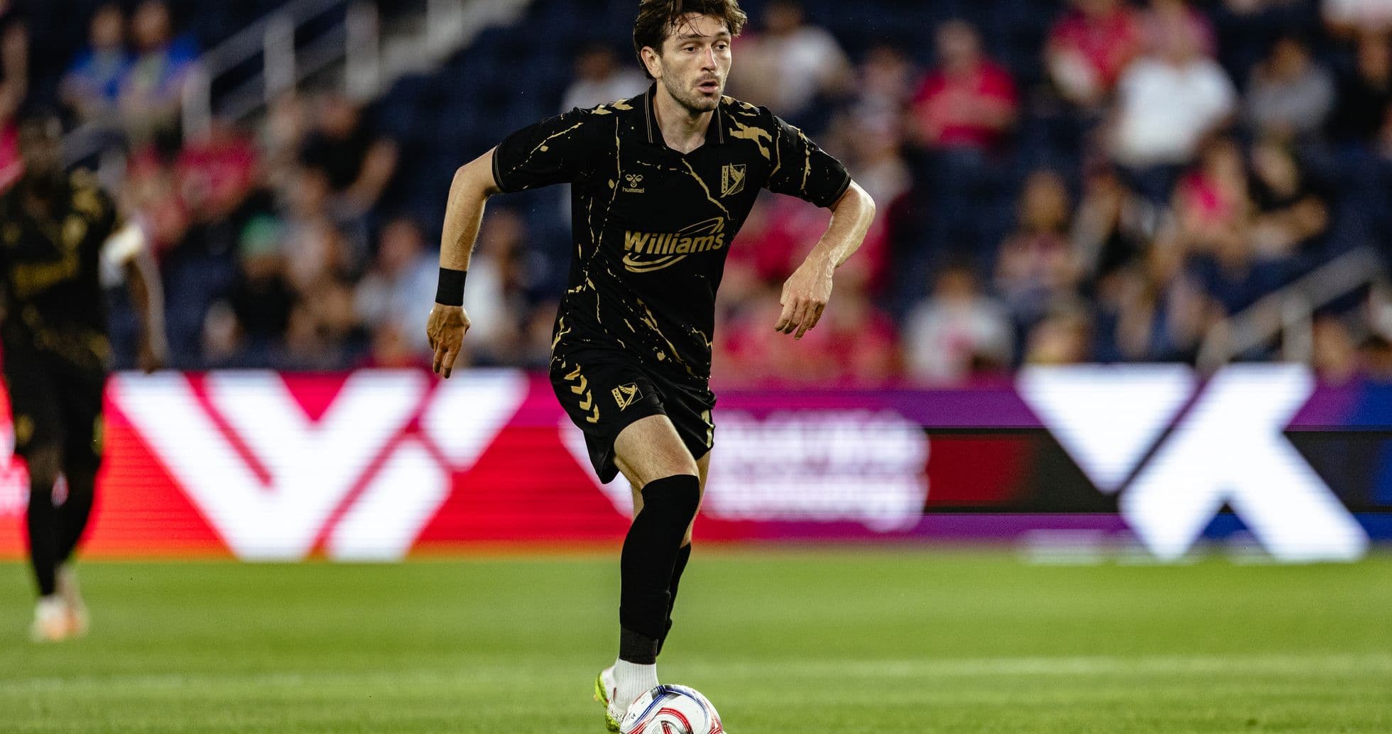 Player dribbling the ball during match
