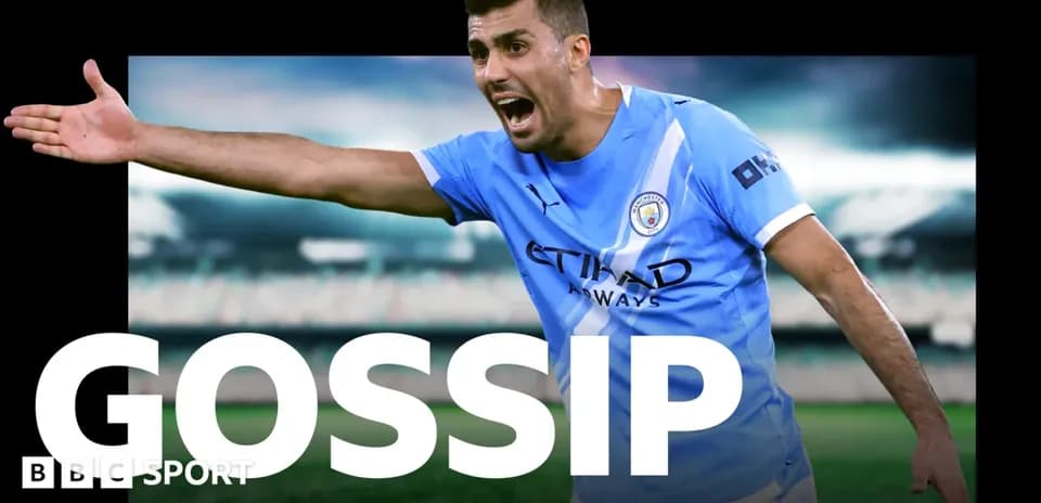 Player gesturing during match with Manchester City jersey
