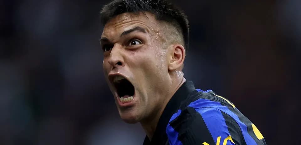 Player celebrating passionately after scoring a goal