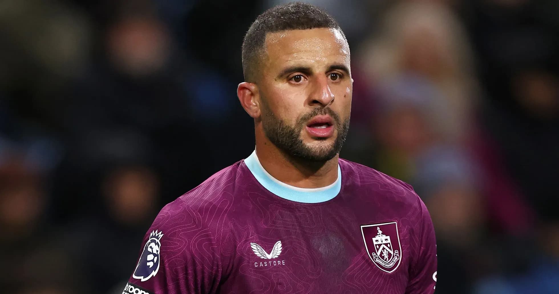 Player wearing Burnley kit during match