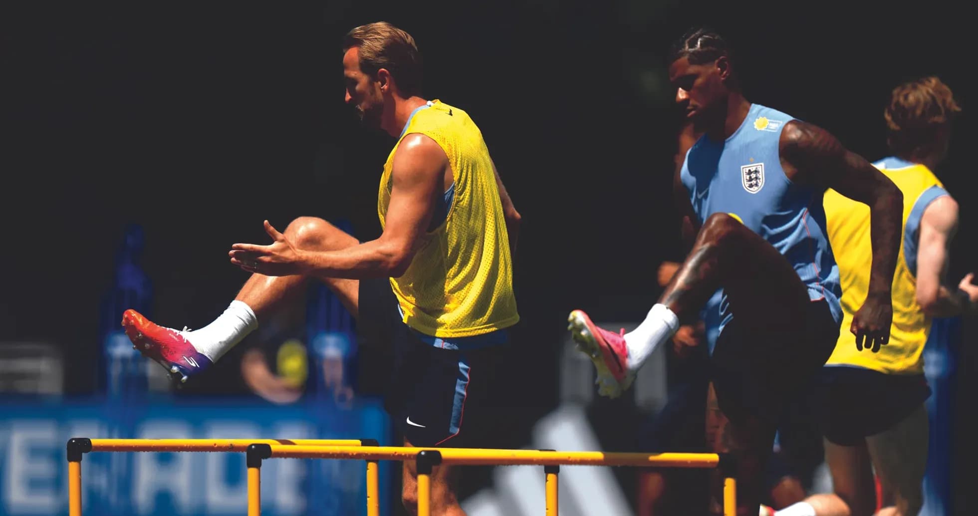 Players training with hurdles during practice session