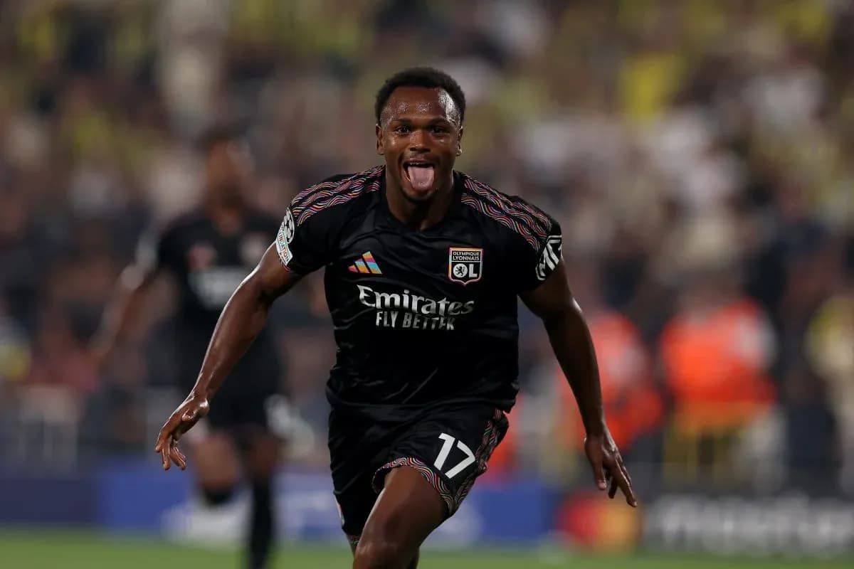 Lyon player celebrating during UEFA Champions League match