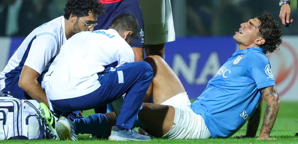 Player receiving medical attention on the field