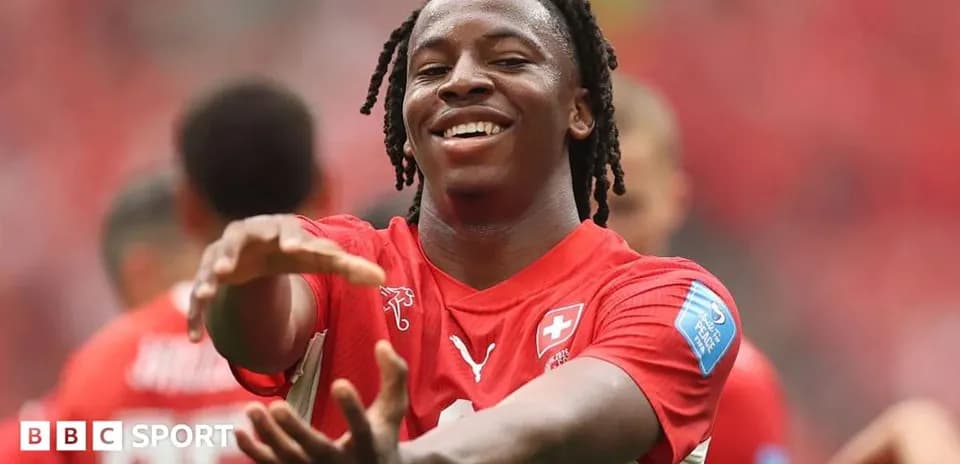 Player celebrating during a match in red uniform