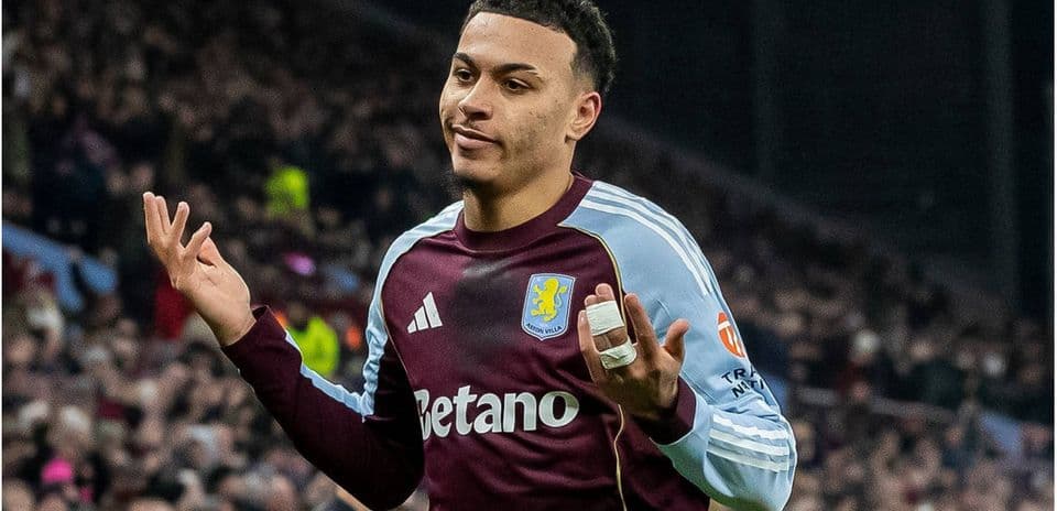 Aston Villa player reacting during a match