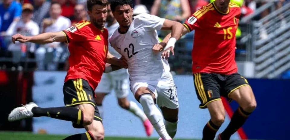 Players from Egypt and Belgium contesting for the ball