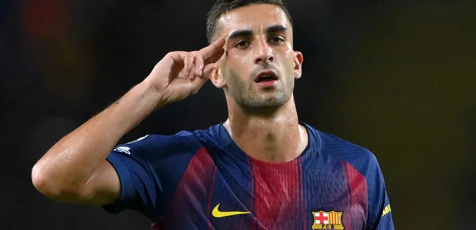 Player celebrating a goal with a salute gesture