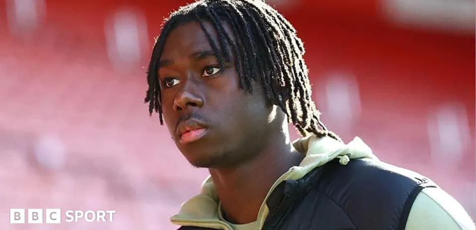 Player walking in stadium before match