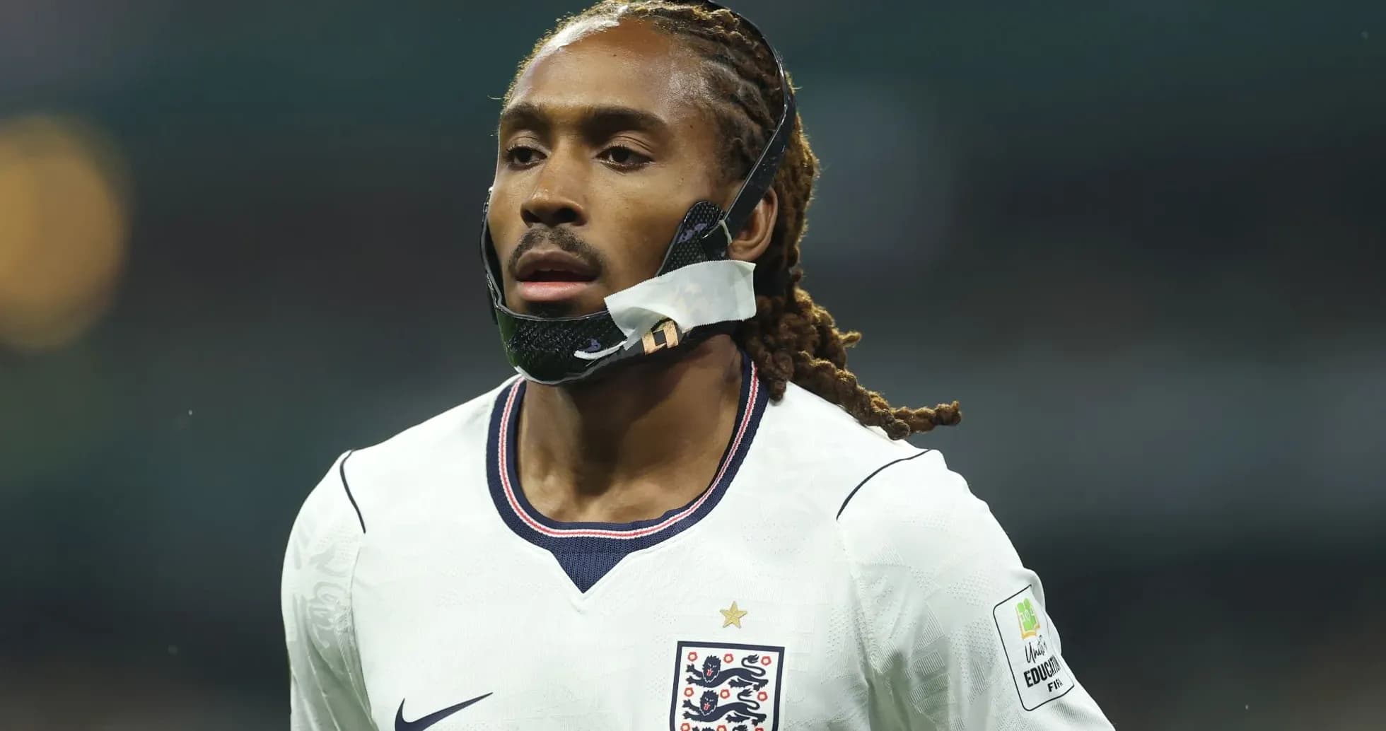 Player wearing protective mask during match