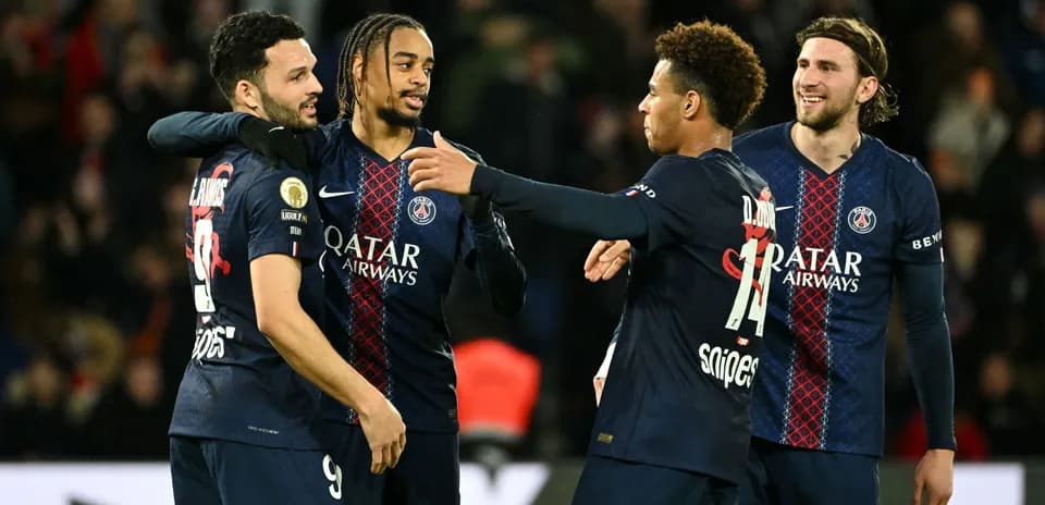 PSG players celebrating a goal on the pitch