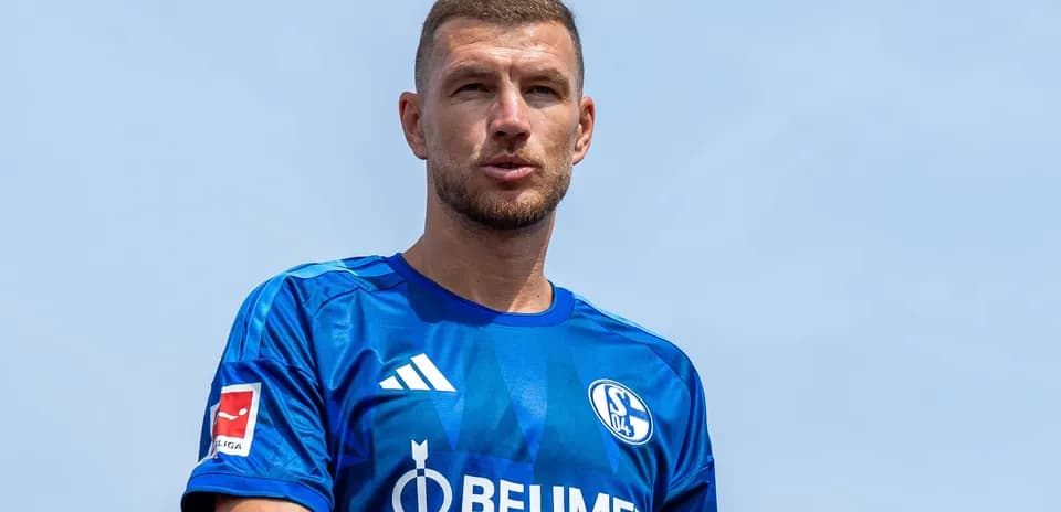 Player in blue Schalke 04 jersey outdoors