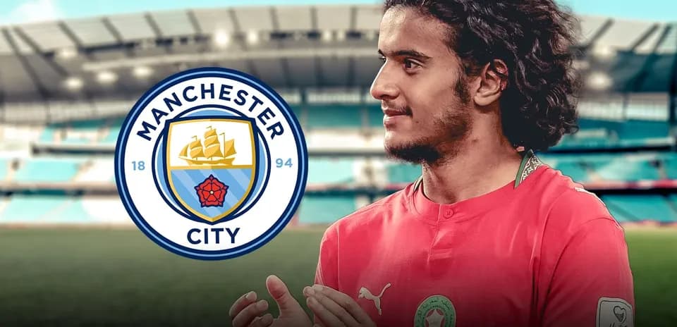 Player in Manchester City kit at stadium