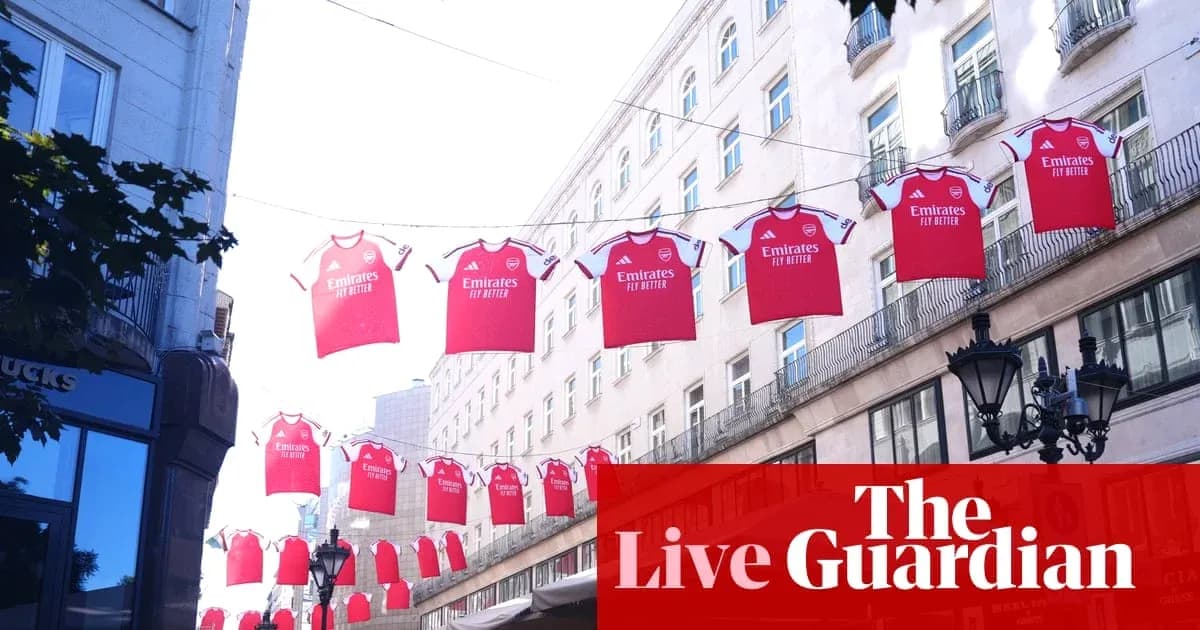 Arsenal jerseys hanging across a street