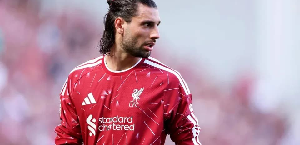 Goalkeeper in Liverpool jersey during match