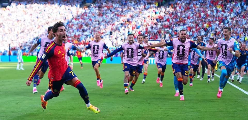 Spain players celebrating a goal against Argentina