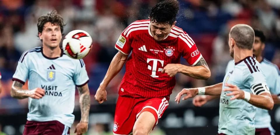 Player heading the ball during match action