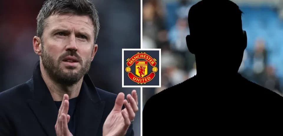 Coach gesturing next to Manchester United logo