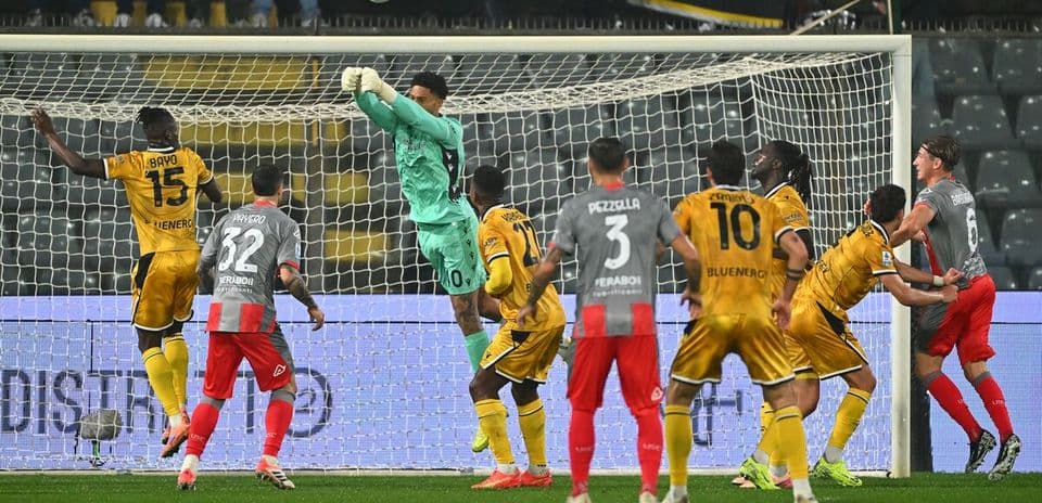 Goalkeeper catching the ball during Serie A match