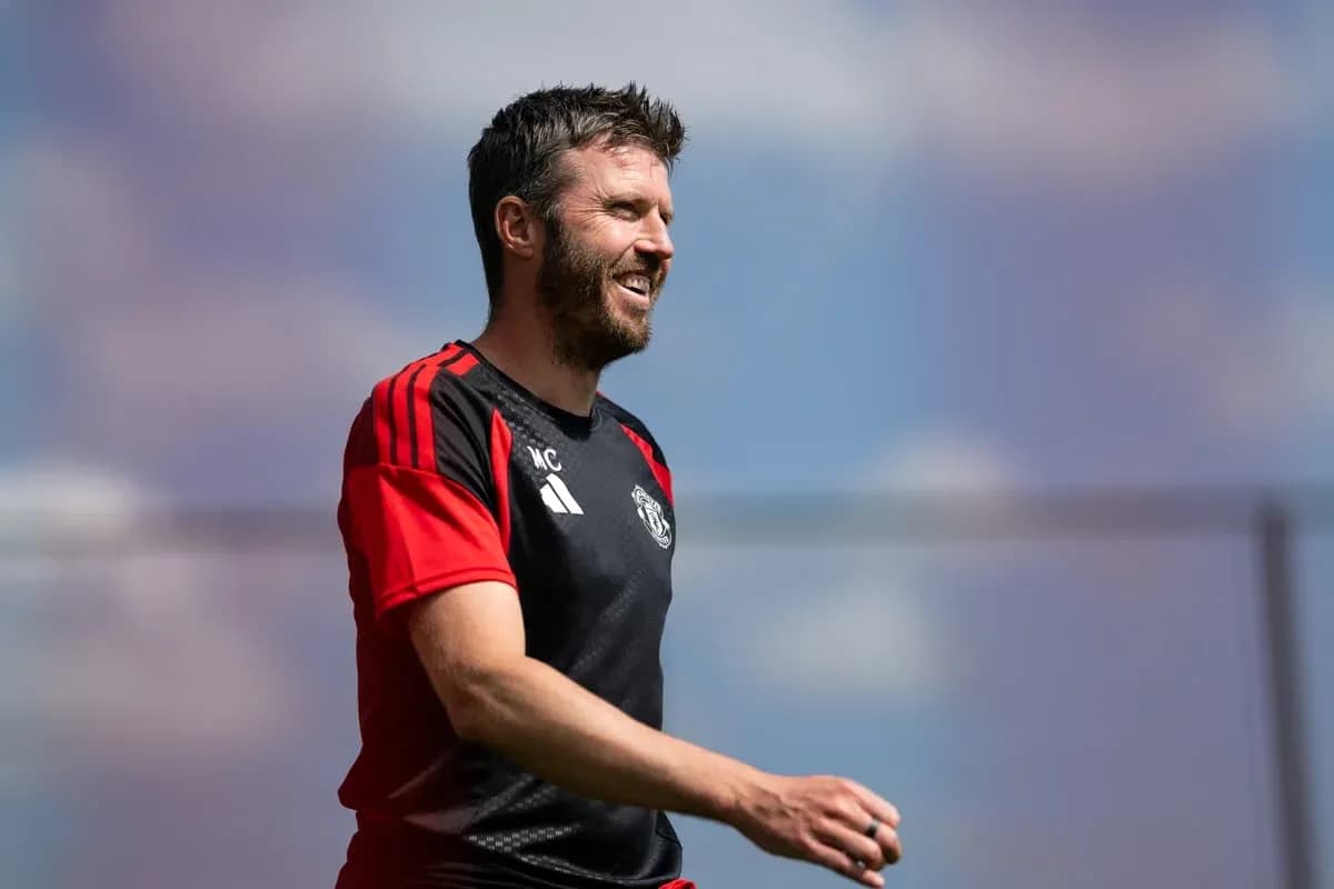 Coach Michael Carrick smiling during training session