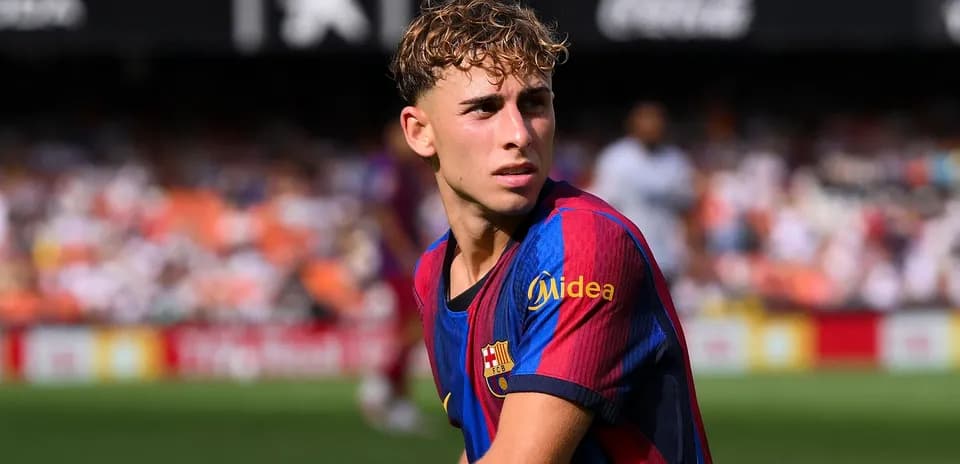 Barcelona player looking focused on the pitch