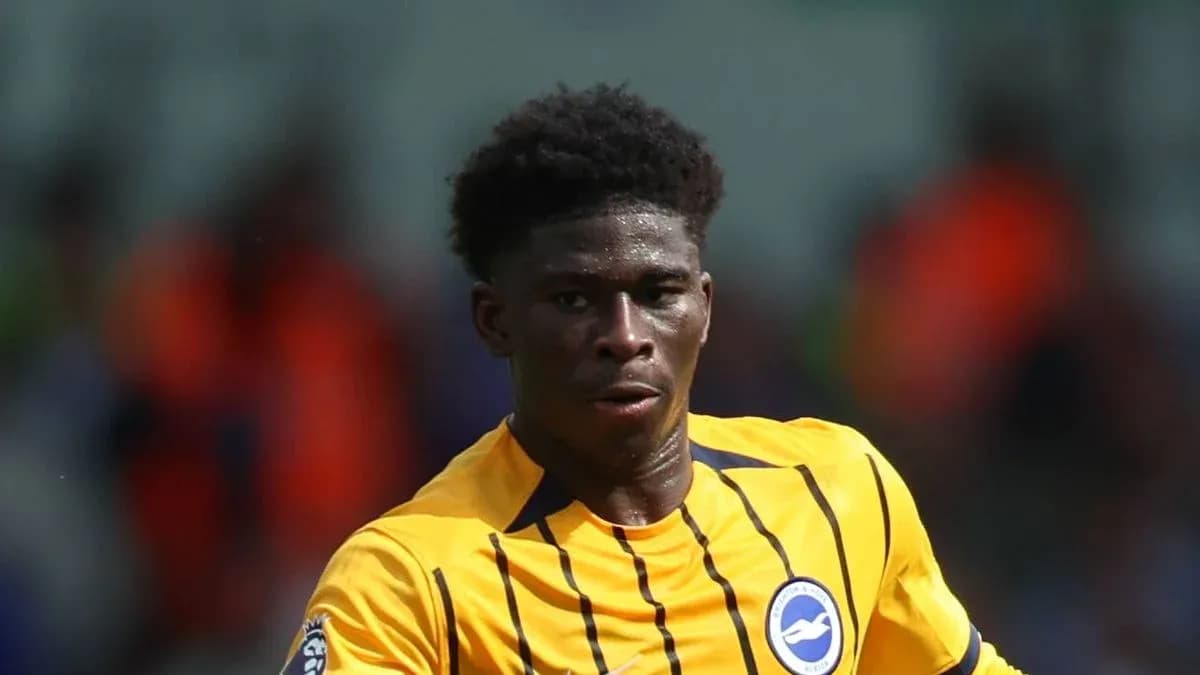 Player in yellow kit running during a match