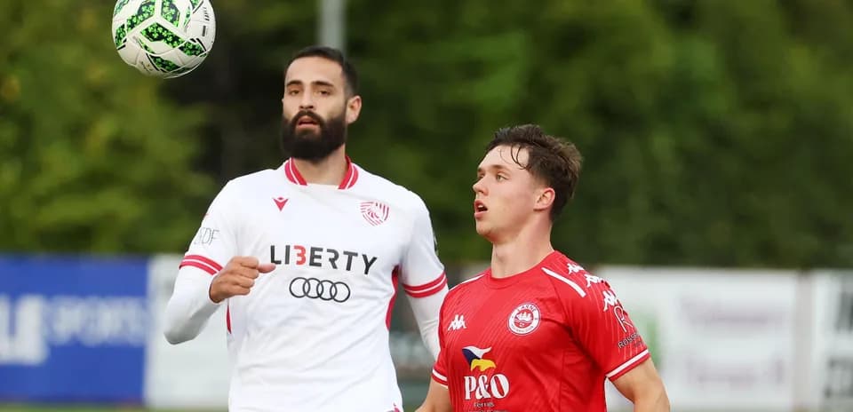 Players from Larne and Saburtalo in action
