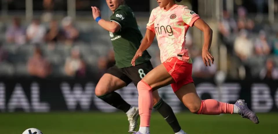 Player sprinting with ball during match