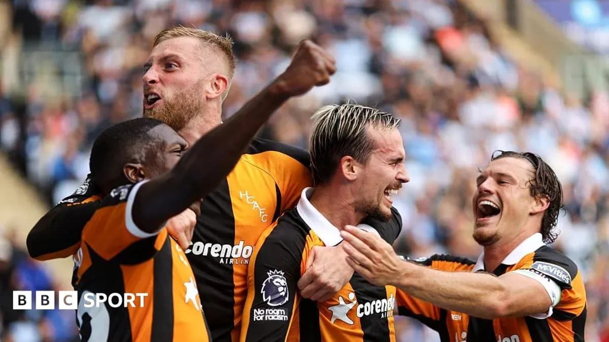 Players celebrating a goal during a match