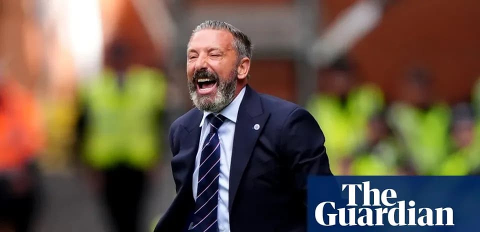 Manager celebrating on the sidelines during match