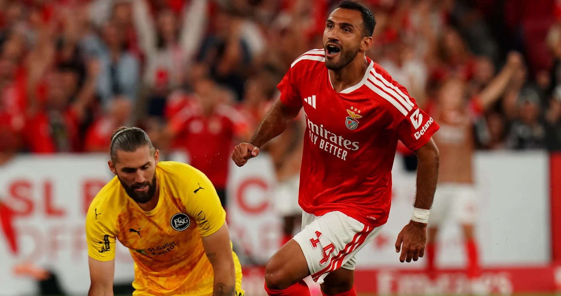 Benfica player celebrating after scoring a goal