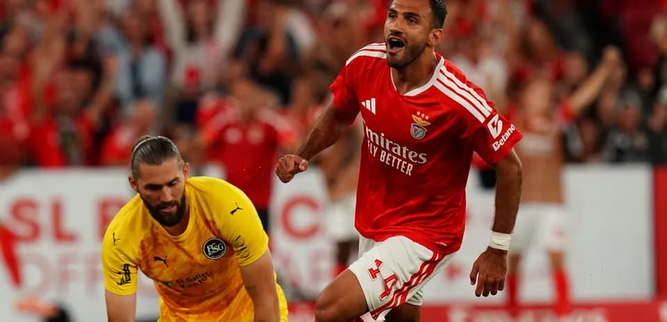 Benfica player celebrating after scoring a goal