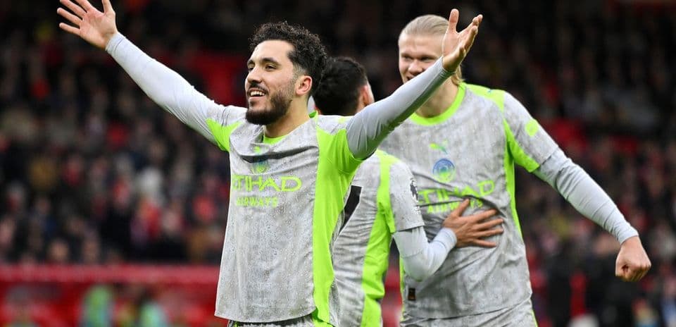 Manchester City players celebrating a goal