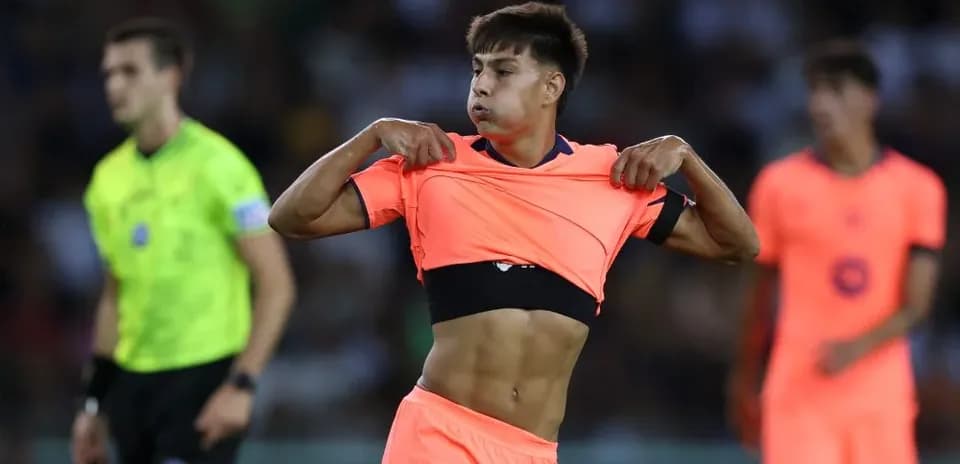 Player changing shirt during match on field