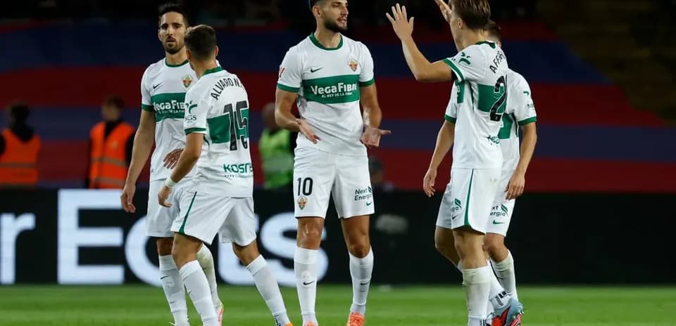 Elche players celebrating during La Liga match