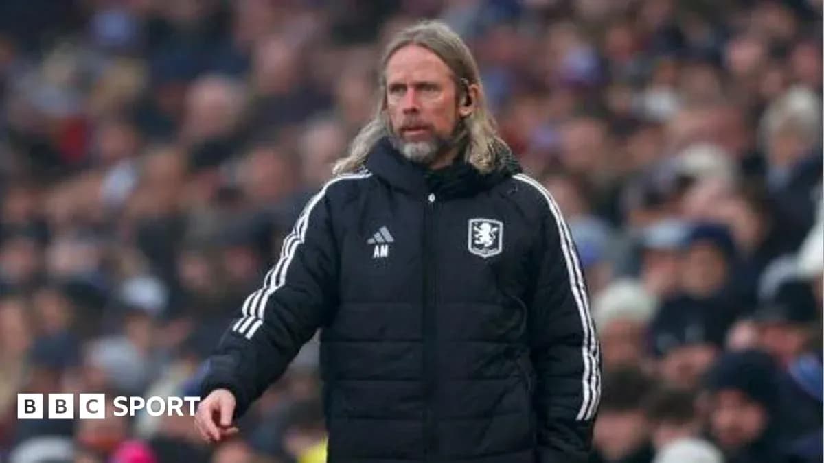 Manager on the sideline during a match