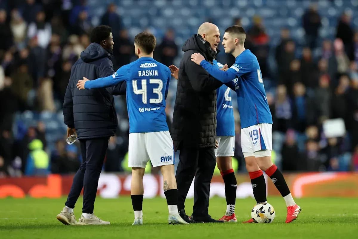 Players and coach discussing after the match