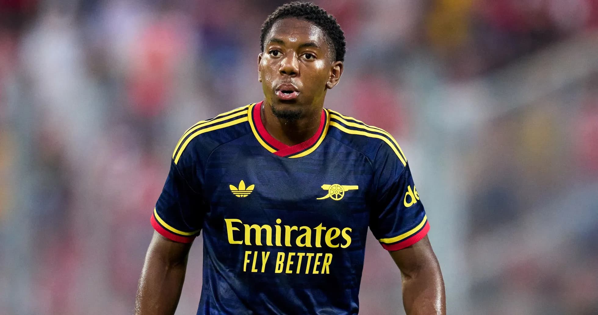 Player in Arsenal jersey during a match